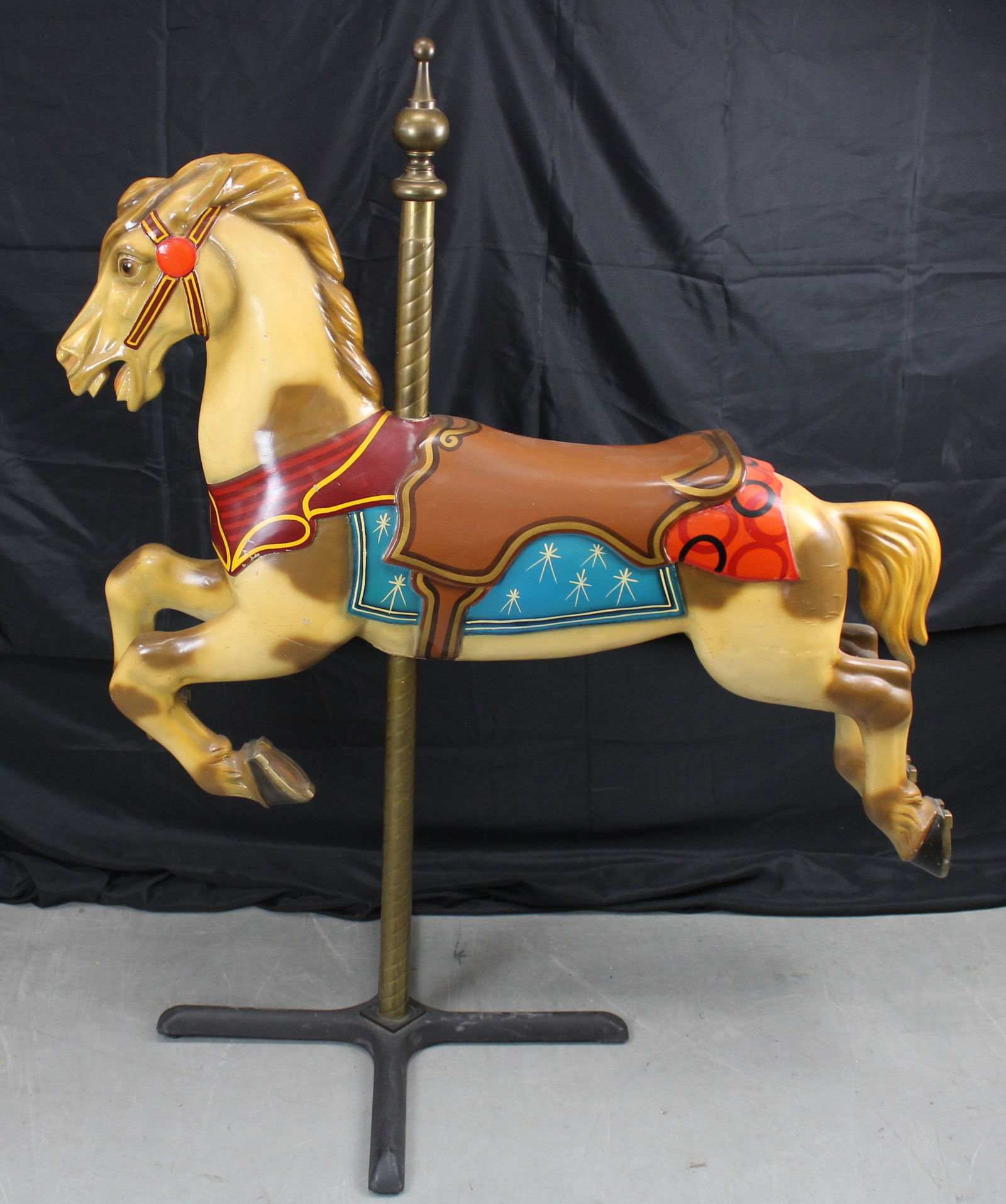 Antique Wood Carousel Horse with Stand: Antique Wood Carousel Horse with Stand. Very nice antique tan and brown spotted carousel horse with metal stand and brass pole. The horse has a brown painted saddle with yellow accents and orange and