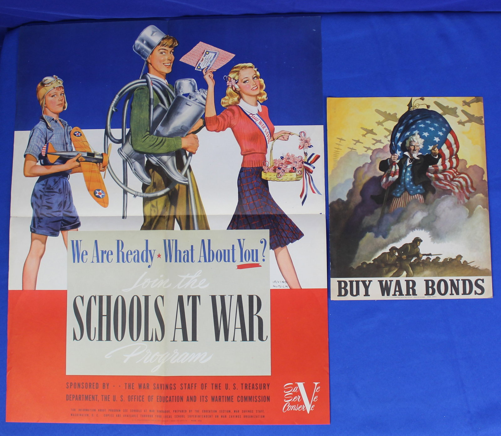WWII "Buy War Bonds" and "Schools at War" Posters (3P): Lot of 2 original 1942 WWII posters that are a WSS 510-A Buy War Bonds poster and a Schools at War Poster. The Buy War Bonds poster has some very light wear but appears to have never been hung as it h