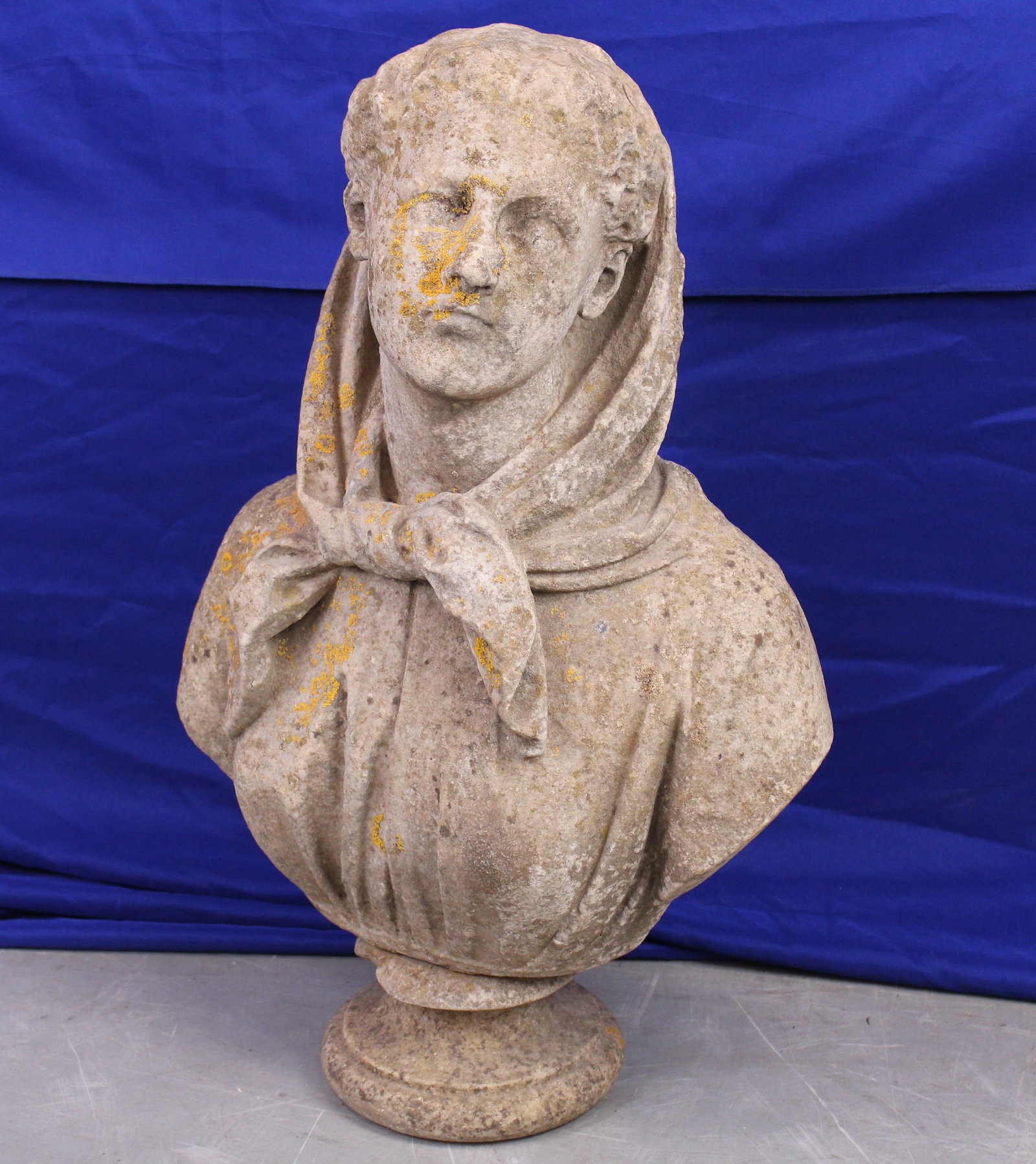 Marble Bust: Large very heavy marble bust of a woman with a hood. The bust has some patina and light wear, but overall is in very good condition. See photos for added detail. Wear is consistent with age and use. T