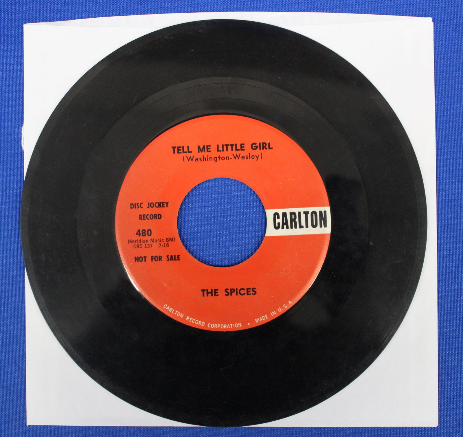 "Tell Me Little Girl" The Spices 45rpm Record: Doowop 45 by the Spices on Carlton records from 1958. The runouts on "Tell Me Little Girl" side is CRC-137 and the runouts on the b side "Money, Fortune, and Fame" are CRC-138. In the dead wax both si