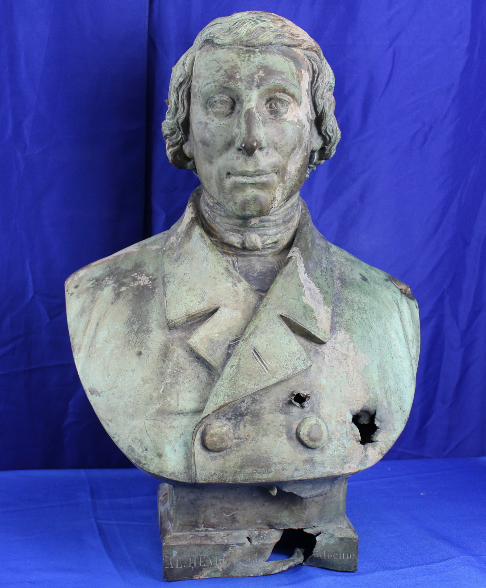 19th Century French Bronze Medical Bust with Dramatic Projectile / Battle Damage: Antique 19th century French bronze portrait bust. Features a rich green patina and dramatic projectile punctures / shrapnel damage all over. Likely sustained during 20th century wartime conflict in
