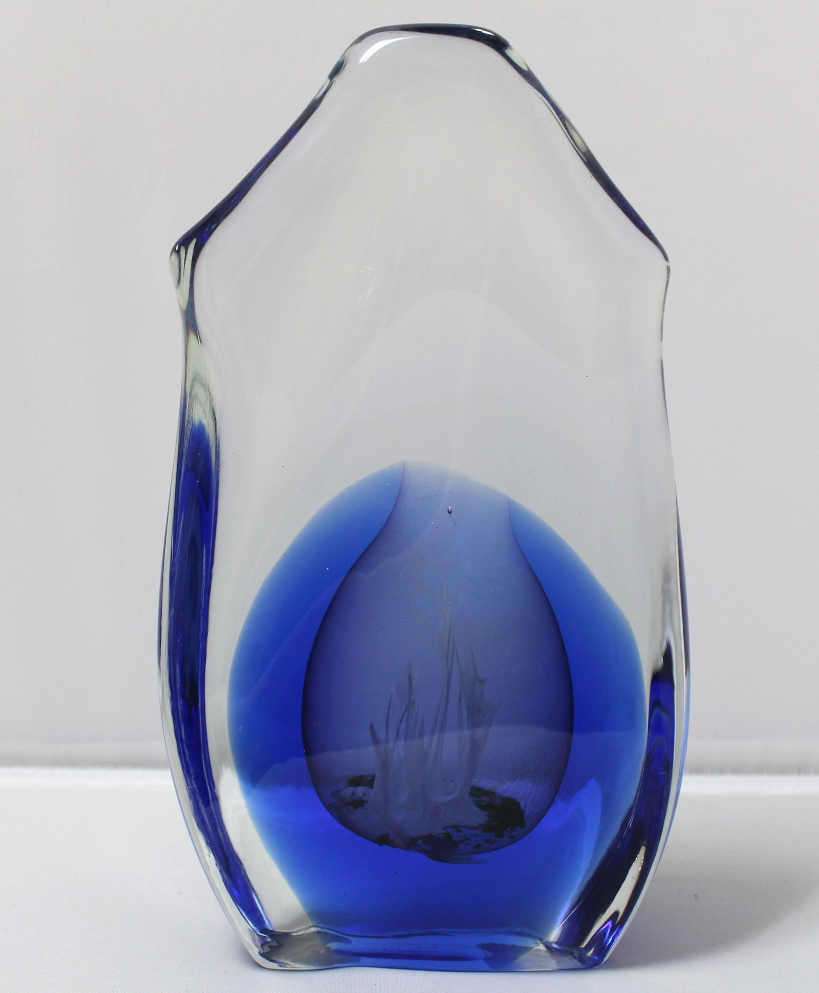 Dominick Labino Sea Kingdom Glass Sculpture: Glass sculpture by Dominick Labino with blue and white colors that is one from his series of "Sea Kingdom" sculptures. The bottom of the sculpture has the etched signature of the artist and is dated,