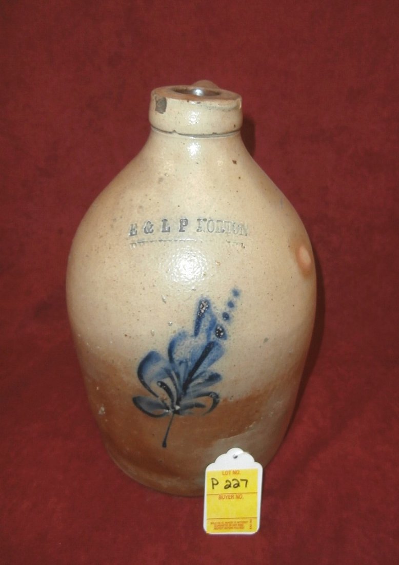 Stoneware Jug: Stoneware Jug with blue floral decoration on front, by E & LP Norton, 11" tall