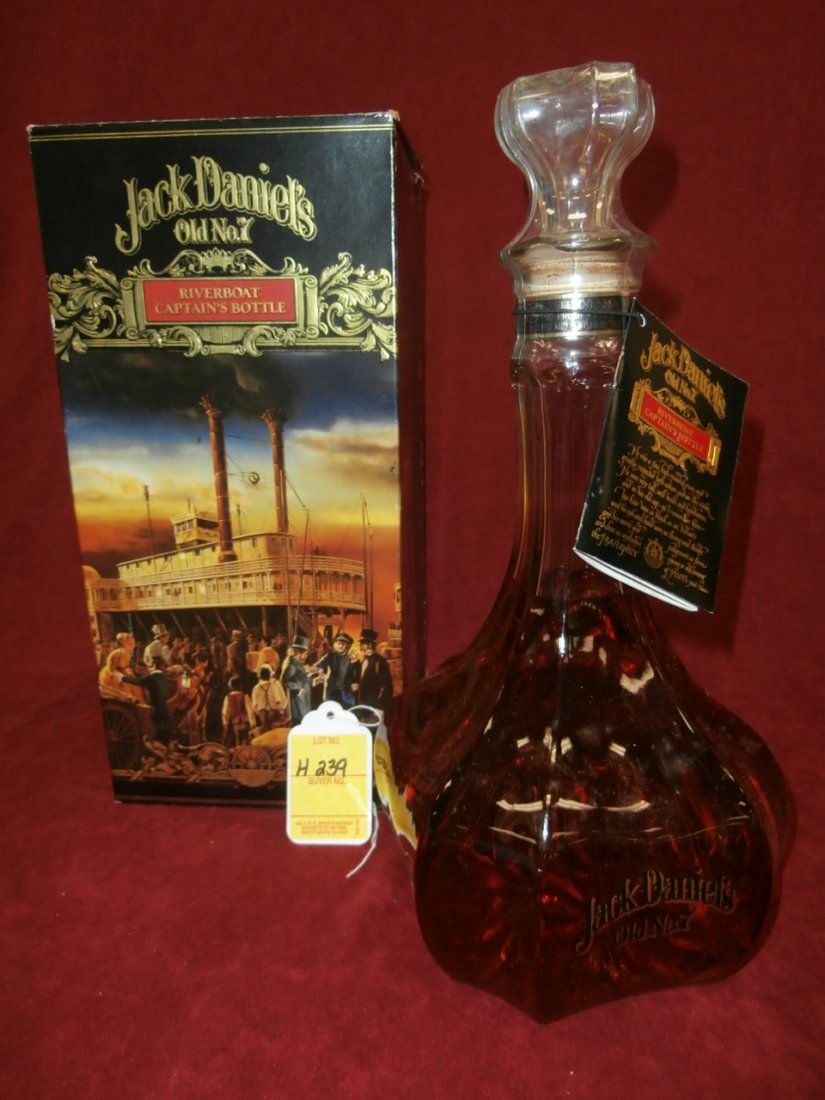 Jack Daniels Riverboat Captain's Bottle: Jack Daniels Riverboat Captain's Bottle. 1.75 liter of Old No. 7 in glass decanter. Sealed with clean registration tag.