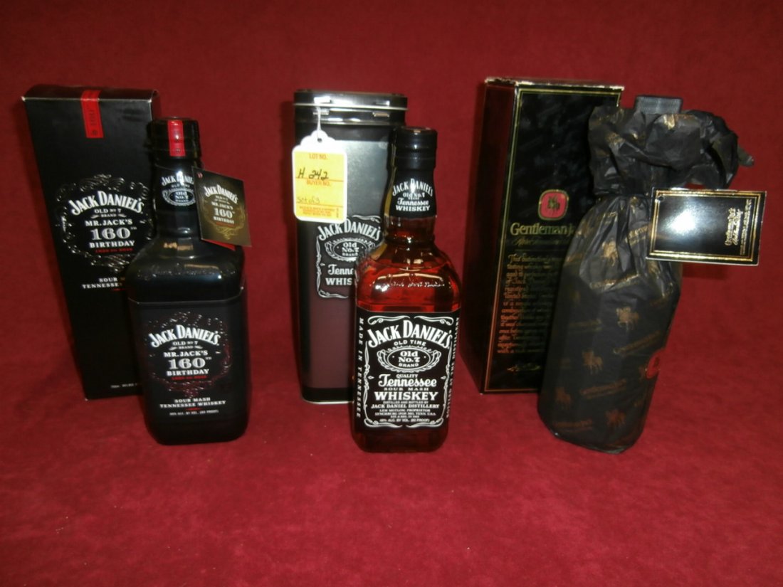 "3" Bottle Lot Of Jack Daniels: "3" Bottle Lot of Jack Daniels. Mr. Jack's 160th Birthday, Jack Daniels bottle in collector tin and bottle of Gentleman Jack.