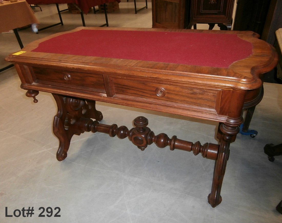Rosewood Victorian Desk: Rosewood Victorian felt top desk with beautiful carved legs and finial. 48" X 31" X 25" deep