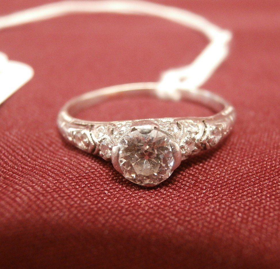 14Kt White Gold 1/2ct Center Diamond W/ Diamonds: 14Kt White Gold 1/2 ct Center Diamond W/ Small Diamonds Around the Center 1.9 dwt