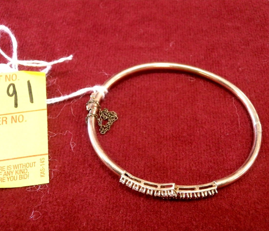 14Kt Gold Diamond and Ruby Bangle Bracelet: 14Kt Gold 8 Diamonds and 8 Rubies Bangle Bracelet 4.4 DWT