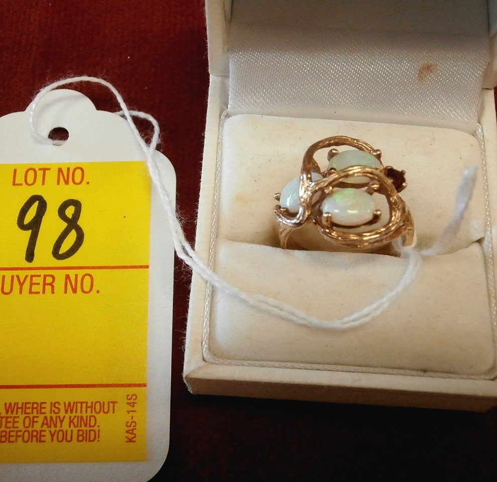 10Kt Three Opal and Garnet Custom Ring: 10Kt Three Opal and Garnet Custom Ring 3.4 Dwt Size 6 3/4