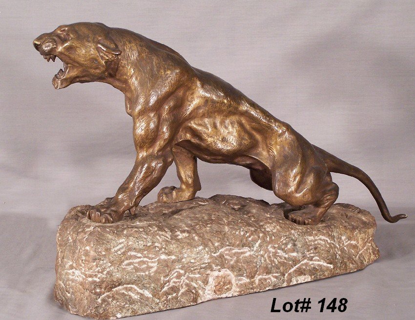 Thomas F Cartier Bronze Panther on Soapstone: Thomas F Cartier born in Marseilles, France in1879 Bronze Panther on Soapstone signed Cartier Measure 16" High, 24" Long with 8 1/2" wide base and4 1/2" wide at the sculptures center Old Original Pati