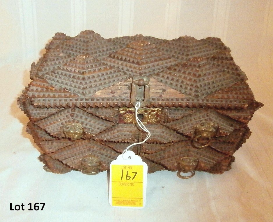 Tramp Art Jewelry Box With Lion Head: Tramp Art Jewelry Box with lion head 11" wide 6" tall 7" deep there is missing pieces and the hinge back is broken
