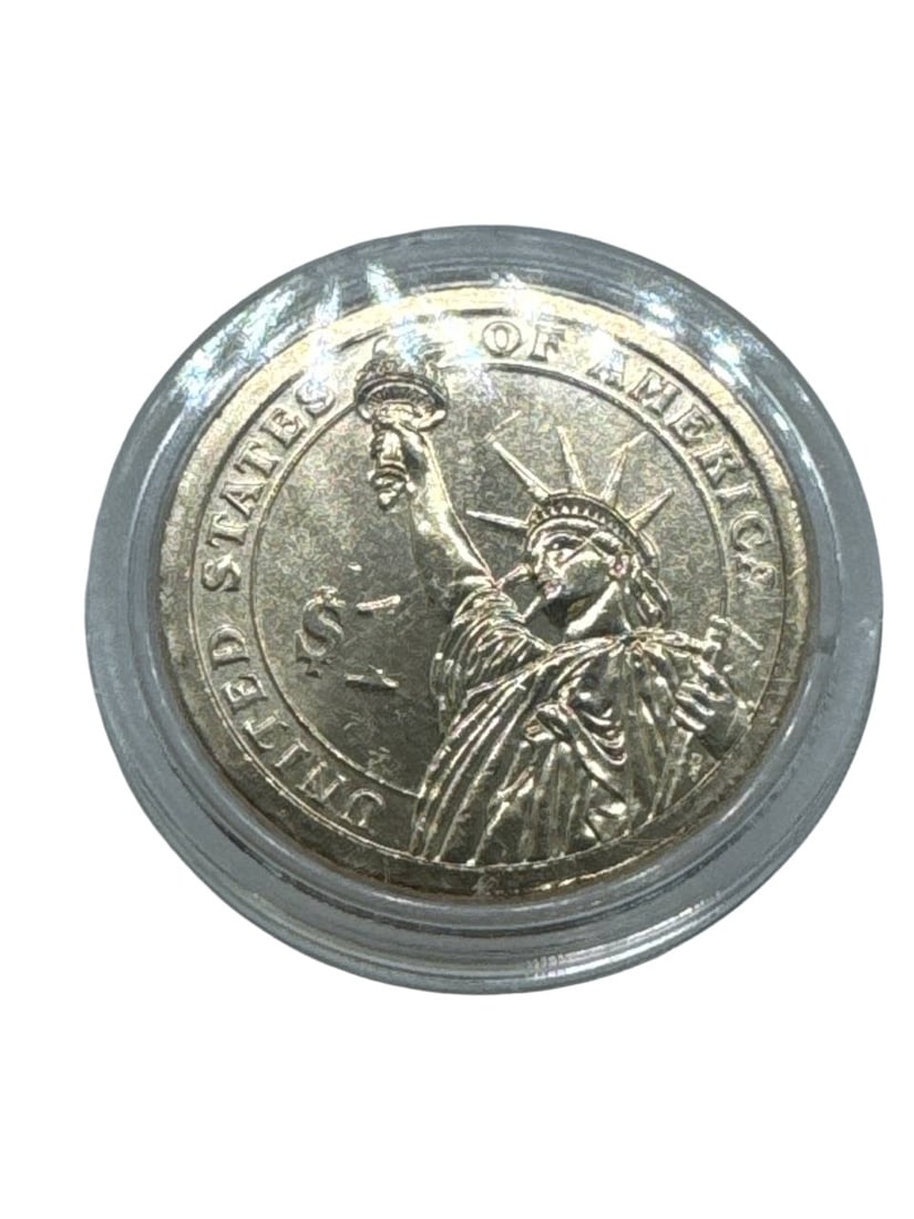 Abraham Lincoln Presidential $1 Coin United States US Mint Collectible: The Abraham Lincoln Presidential $1 Coin is a commemorative piece from the United States Mint, featuring the 16th President of the United States on its obverse side. Crafted with precision, this coin 