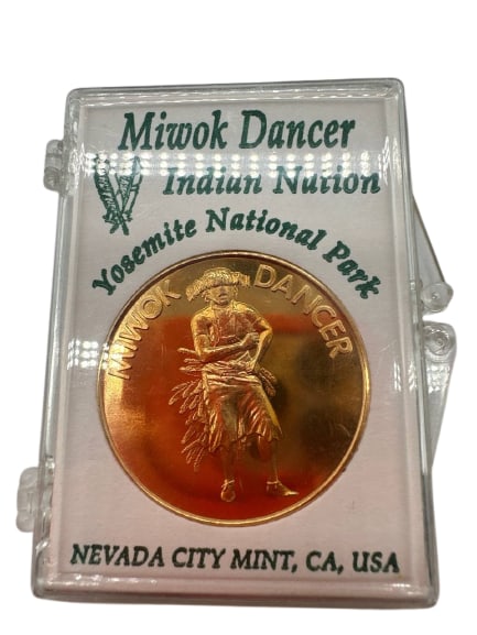 Miwok Dancer Yosemite National Park Gold Color Coin Nevada City Mint CA: The Miwok Dancer Coin from the Nevada City Mint in California is part of the Yosemite National Park collection, capturing the rich cultural heritage of the Miwok Indian Nation. This intricately design