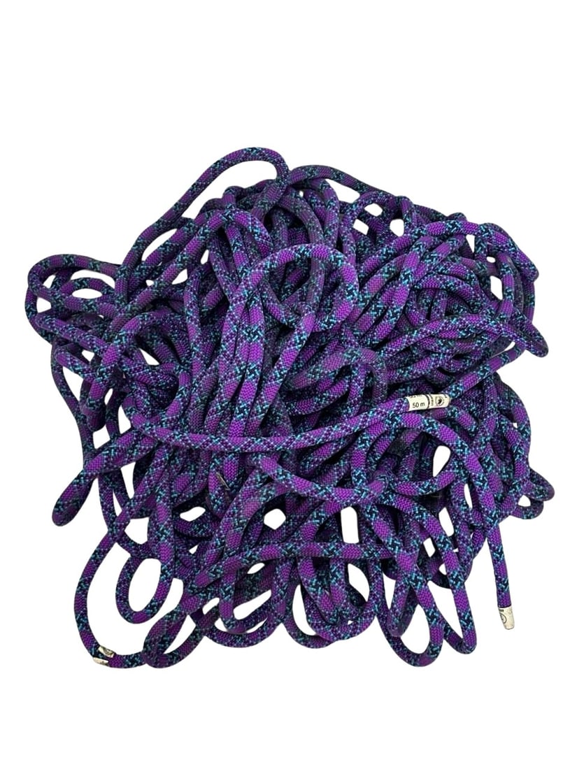 Arova-Mammut Climbing Rope 50m Blue Purple No1: The Arova-Mammut Climbing Rope is designed for climbers seeking reliable performance and durability. With a length of 50 meters, this rope is ideal for both indoor and outdoor climbing adventures. Its