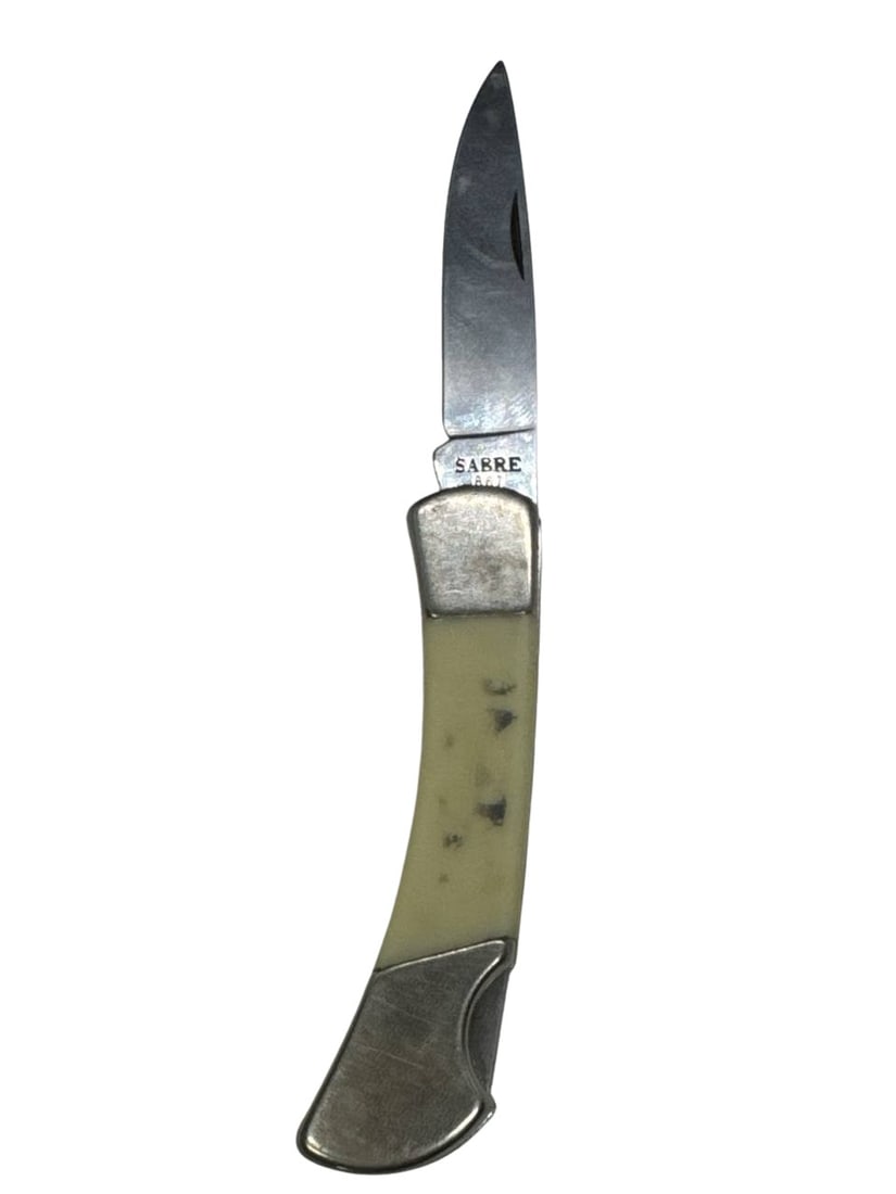 Sabre 667 Vintage Folding Pocket Knife Stainless Hong Kong 3 Inch: The Sabre 667 Folding Pocket Knife is a vintage piece crafted with a stainless steel blade and an ivory-colored handle. Made in Hong Kong, this compact knife measures approximately 3 inches when close