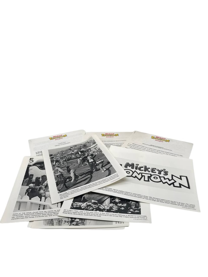Mickey's Toontown Disneyland Opening Press Kit 1993 EphemeraCollectibles: The Mickey's Toontown Disneyland Opening Press Kit is a captivating collection of historical ephemera from the beloved theme park's 1993 debut. This rare set includes black and white photographs, offi