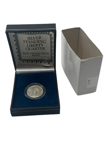Silver Standing Liberty Quarter San Francisco Mint Collectible Coin: This Silver Standing Liberty Quarter from the San Francisco Mint is a striking collectible that captures a piece of American numismatic history. Encased beautifully, the quarter showcases the iconic L