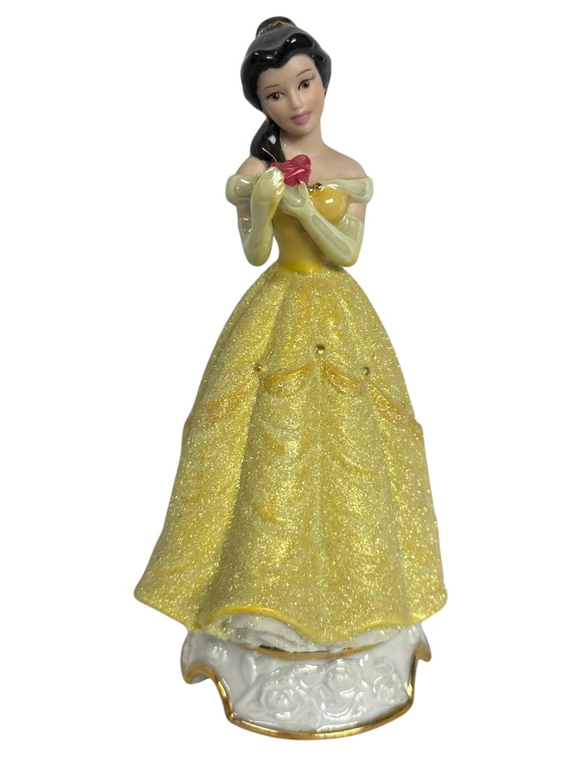 Disney Princess Belle Figurine Collectible Ornament Ceramic 7 in: The Disney Princess Belle Figurine is a beautifully crafted collectible ornament that captures the elegance and grace of Belle, one of Disney's beloved princesses. Standing at 7 inches tall, this exqu