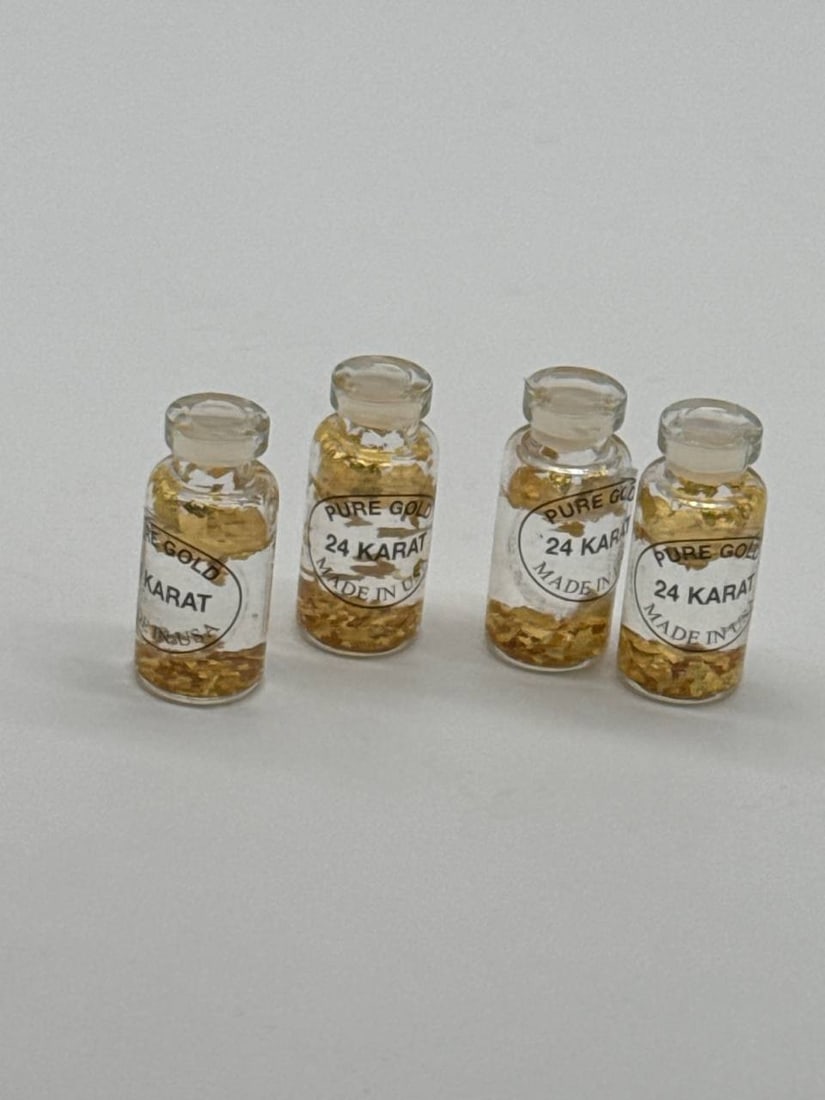 Pure Gold 24 Karat Made In USA Glass Vials Set 2x1 in: Discover the elegance and allure of owning a piece of pure luxury with this set of glass vials filled with 24 Karat pure gold flake. Made in the USA, these vials encapsulate the highest quality gold, 