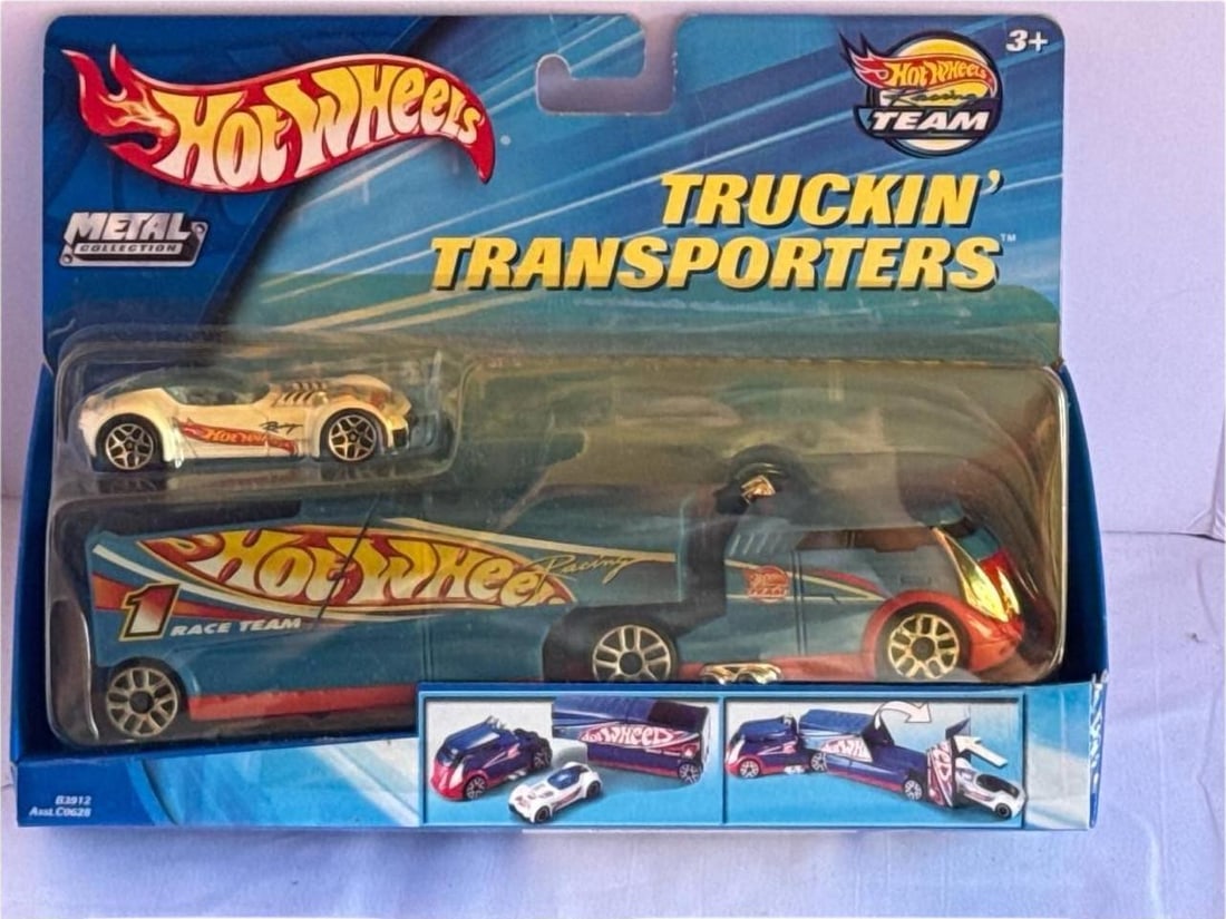 Hot Wheels Truckin Transporters Nissan Skyline Race Team 8 In Box: Hot Wheels Truckin Transporters Nissan Skyline Race Team is a thrilling collectible from 2003 that blends dynamic design with timeless die-cast appeal. This sealed edition features a specialized trans