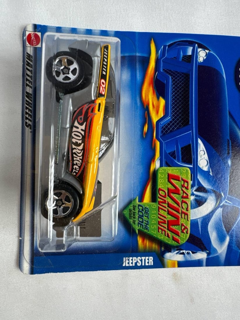 Hot Wheels Jeepster 02 Race Win Online Mattel Brand New Sealed Toy Car: Hot Wheels Jeepster 02 Race Win Online from Mattel features an iconic bright and fiery design that highlights the collectible spirit of early 2000s releases. This model arrives in brand new sealed pac
