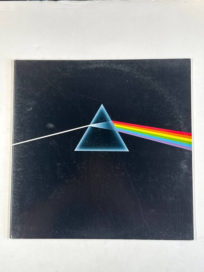 Pink Floyd The Dark Side Of The Moon 1973 Vinyl Album Lp: Pink Floyd The Dark Side Of The Moon 1973 Vinyl Album Lp remains one of the most iconic and influential releases in the history of rock music. Known for its groundbreaking production, seamless transit