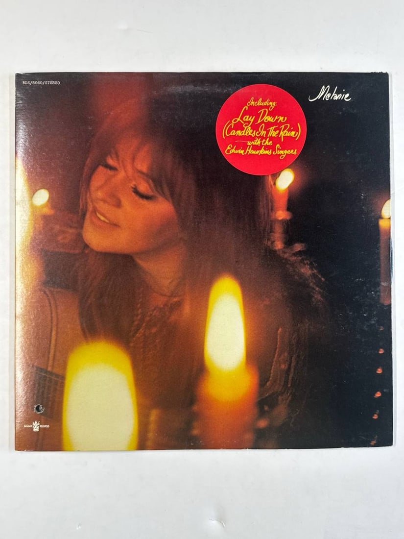 Melanie Candles In The Rain Vintage Vinyl Record 12 Inch LP Lay Down Edwin Hawkins: Melanie Candles In The Rain Vinyl Record is a classic 1970 release showcasing the soulful fusion of folk rock and pop music. This album features the uplifting track Lay Down (Candles In The Rain) perf