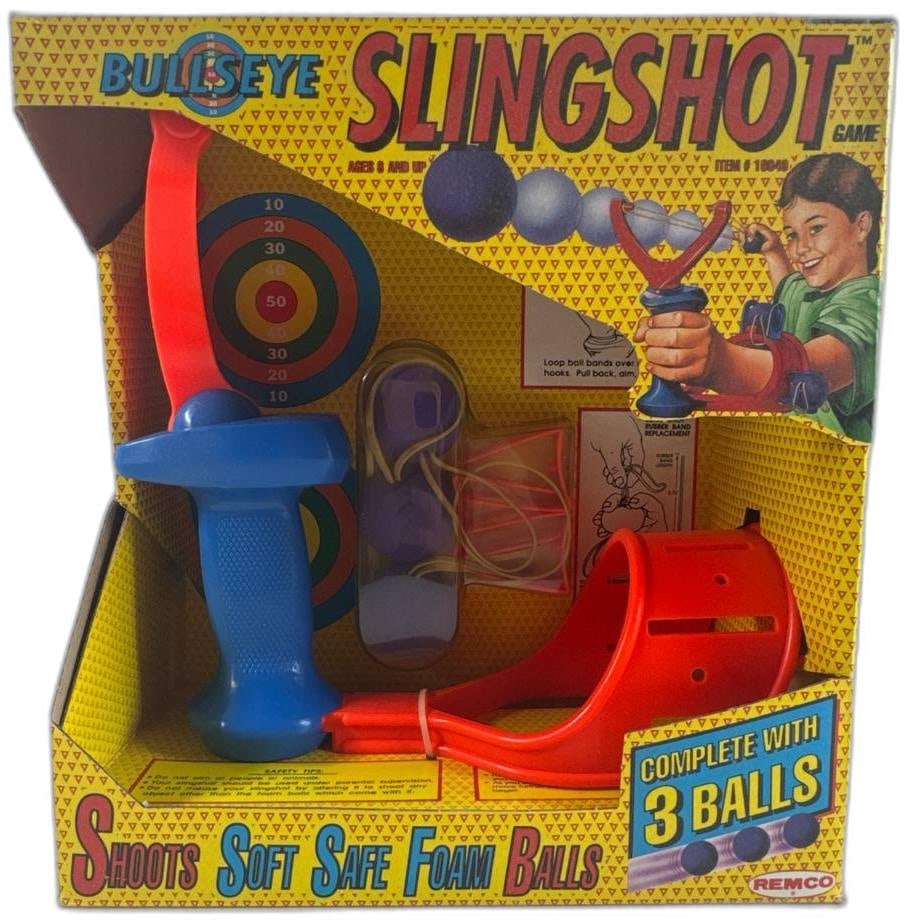 Remco Bullseye Slingshot Game With Target And 3 Foam Balls Unopened: Remco Bullseye Slingshot Game With Target And 3 Foam Balls Unopened is a delightful piece of playtime nostalgia that blends the thrill of a classic slingshot with the safety of soft foam projectiles. 
