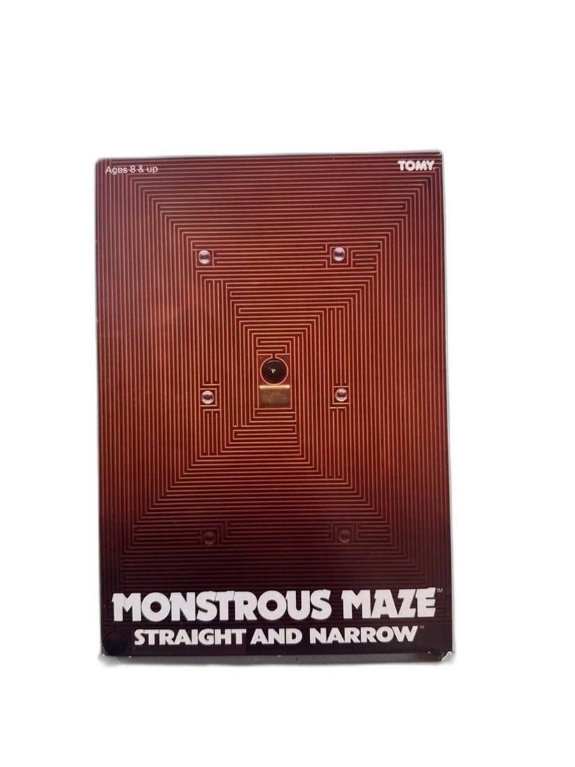 Monstrous Maze Toy Straight And Narrow Tomy 1982 Vintage Labyrinth Puzzle Gaming: Experience the challenge of a vintage 1982 Monstrous Maze Straight And Narrow from TOMY. This unique labyrinth puzzle requires tilting the board to guide the metal balls through narrow passages, avoid