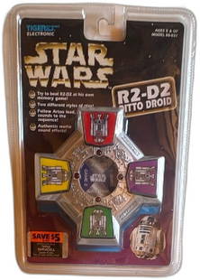 Star Wars R2-D2 Ditto Droid Game 1997 Tiger Electronics New: Star Wars R2-D2 Ditto Droid Game by Tiger Electronics, released in 1997. This electronic game is a fun, memory-based toy for ages 6 and up, challenging players to replicate sequences created by R2-D2.