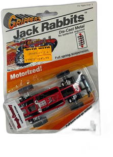 Grippers Jack Rabbits Diecast Motorized Buggy Red Unopened Pull Back Car: Grippers Jack Rabbits Diecast Motorized Buggy Red Unopened Pull Back Car from 1986 is a classic collectible that captures the excitement of vintage toy engineering. This piece features a sturdy diecas