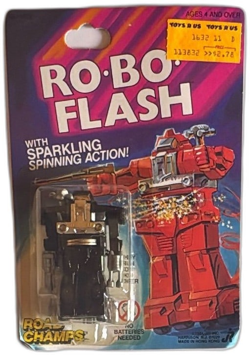 1984 Road Champs Robo Flash JR Robot Toy Sparkling Spinning Action MOC: Vintage 1984 Road Champs Robo Flash robot toy by JR Inc, made in Hong Kong, mint on card (MOC). Features sparkling spinning action with no batteries needed, runs on kid power. Distinctive black and si