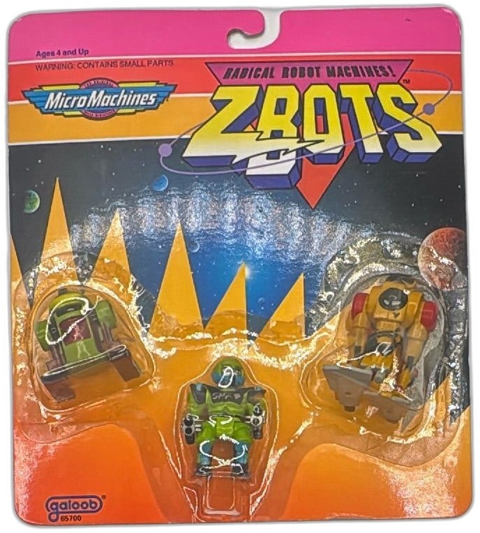 1992 Micro Machines Z-Bots Robot 3 Pack Galoob MOC Vintage Action Figures: Vintage Micro Machines Z-Bots Robot 3 Pack by Galoob, sealed on original card from 1992. Features three collectible mini robot action figures in vibrant colors, including green, yellow, and red, with