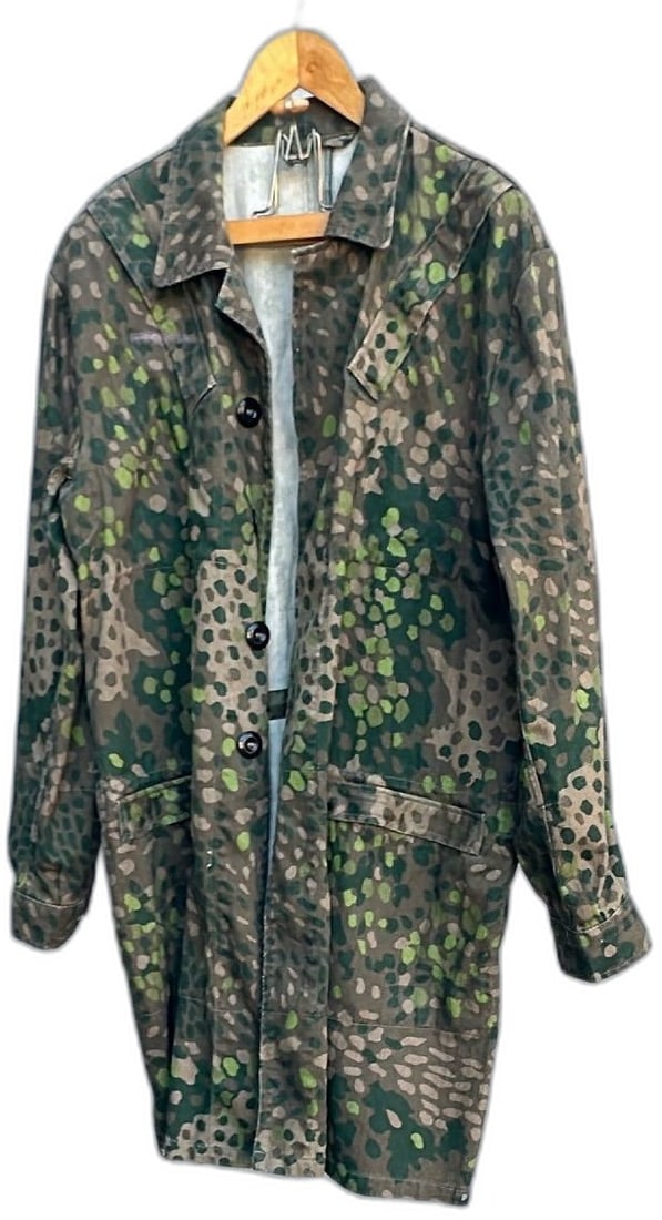 WW2 German Camouflage Parka Dot 44 Pattern Herringbone Twill Size Medium: WW2 German Waffen-SS camouflage parka in Dot 44 pattern, made from herringbone twill cotton. Features distinctive green and brown spotted camouflage, full-length cut, button-up front, and large cargo