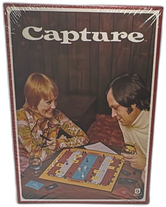 1975 Capture Board Game Gammon Style 26 Vintage Sealed New Old Stock: Vintage 1975 Capture board game by Gammon Games Style #26. Factory sealed and new old stock, making it a perfect collectible item for retro board game enthusiasts. The front box art features two peopl