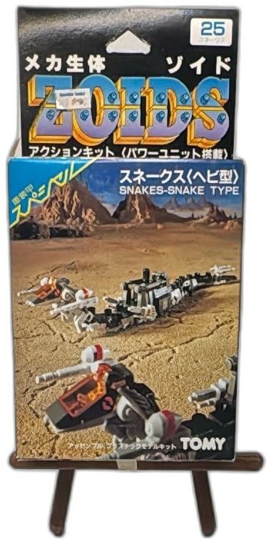 Tomy Zoids RMZ-25 Snakes Snake Type Action Model Kit Vintage Japan Boxed: Tomy Zoids RMZ-25 Snakes-Snake Type vintage action model kit, made in Japan, 1980s, collectible boxed figure. Features original Japanese packaging with mech artwork and TOMY branding. Slight shelf wea