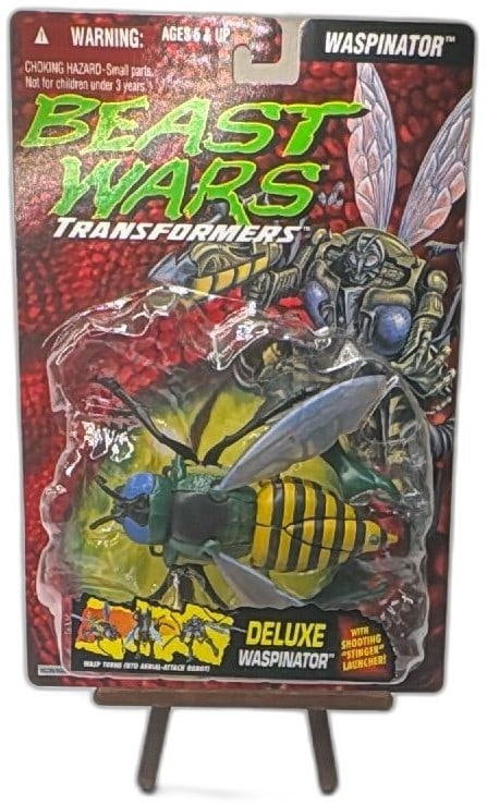 1995 Beast Wars Transformers Deluxe Waspinator Kenner New Sealed Predacon: Beast Wars Transformers Deluxe Waspinator action figure from 1995 by Kenner, Predacon series. Unopened, factory sealed packaging. Features bright green, yellow, and black wasp design, blue eyes, shoot