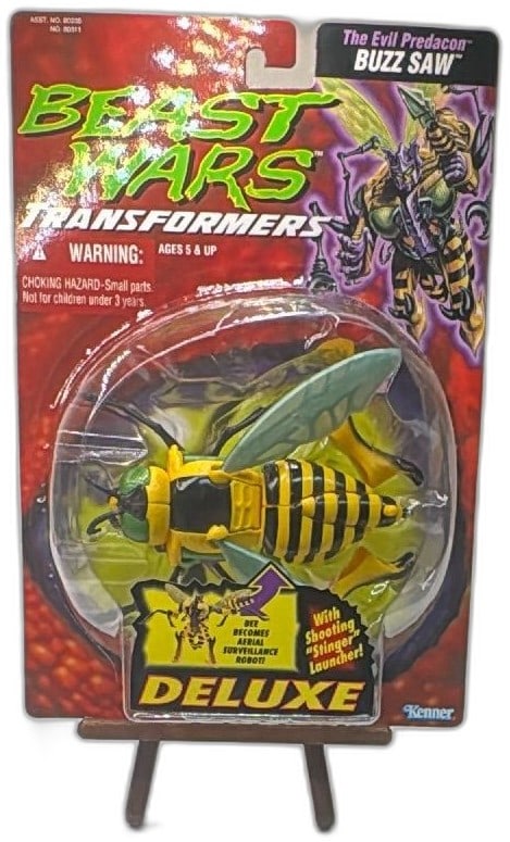Beast Wars Transformers Buzz Saw Deluxe Kenner 1996 MOSC Predacon Figure: Beast Wars Transformers Buzz Saw Deluxe by Kenner, 1996, in original sealed packaging. Features vibrant yellow, black, and green plastic; “Evil Predacon” figure, converts from bee to aerial su