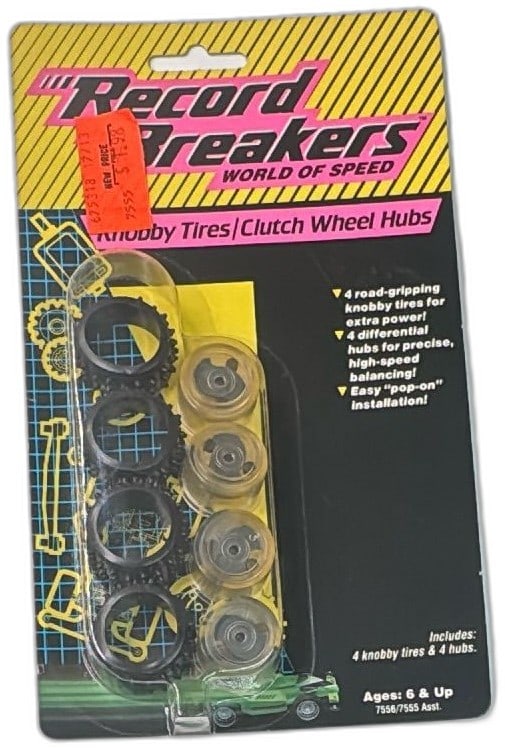 1989 Hasbro Record Breakers Knobby Tires Clutch Wheel Hubs Sealed Set: 1989 Hasbro Record Breakers Knobby Tires Clutch Wheel Hubs, vintage upgrade set for slot or track racing cars. Sealed on original card, includes 4 knobby tires and 4 differential hubs. Made in Japan,