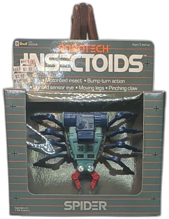 1985 Revell Robotech Insectoids Spider Motorized Toy Figure In Box Vintage: Vintage 1985 Revell Robotech Insectoids Spider motorized toy figure, boxed. Features articulated blue and red legs, lighted sensor eye, and moving pinching claws. Original packaging has surface wear,