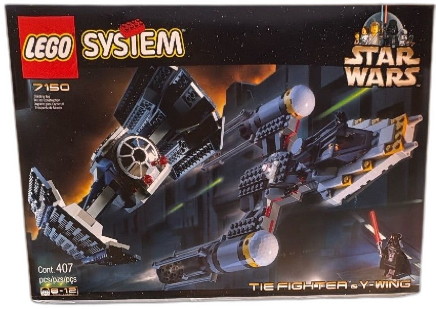 Lego Star Wars 7150 TIE Fighter and Y-Wing 1999 Sealed Box 407 Pieces: Lego Star Wars 7150 TIE Fighter & Y-Wing, 1999 original release, 407 pieces. Classic Lego System set features both iconic ships and minifigures including Darth Vader. Box exhibits light edge and corne