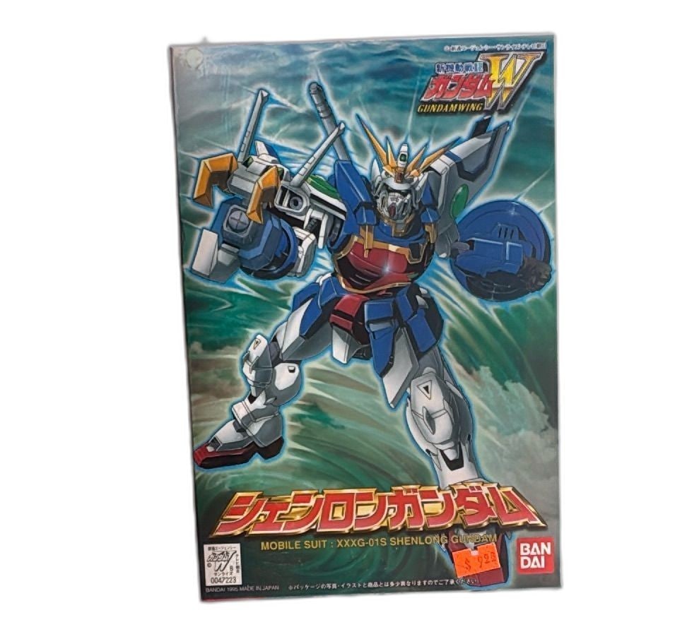 Bandai Gundam Wing 1995 Shenlong Gundam Model Kit XXXG01S Made In Japan: Bandai Gundam Wing Shenlong Gundam Model Kit XXXG-01S from 1995, made in Japan, vintage collectible. This model kit features the iconic Shenlong Gundam from the popular anime series Mobile Suit Gundam