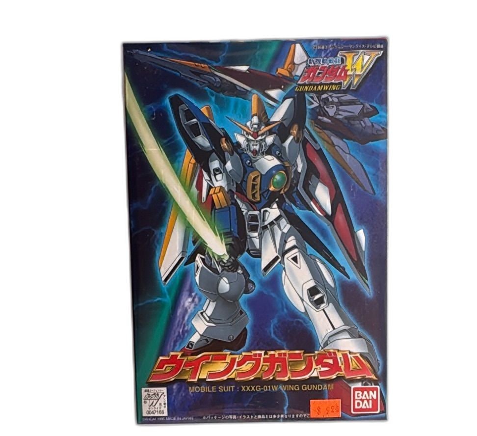 Bandai 1995 Gundam Wing XXXG01W Model Kit 1144 Scale Mobile Suit Japan Boxed: Bandai Gundam Wing XXXG-01W 1/144 Scale Model Kit 1995 Made in Japan. Vintage plastic model kit featuring the iconic Wing Gundam from the Mobile Suit Gundam Wing anime series. Box art showcases the mo