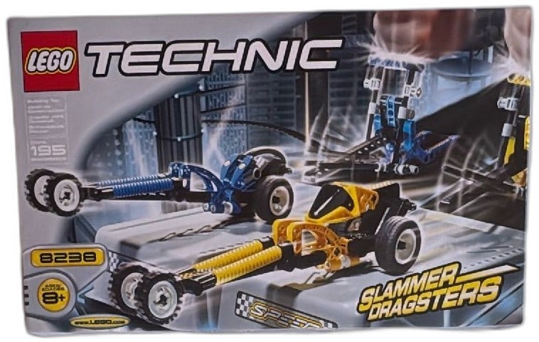 LEGO Technic 8238 Slammer Dragsters 2000 Set New Sealed Box 195 Pieces: LEGO Technic 8238 Slammer Dragsters set, released in 2000, includes 195 pieces to build two racing dragster models. Features vibrant yellow and blue colors, Technic functionality, and slammer launch a