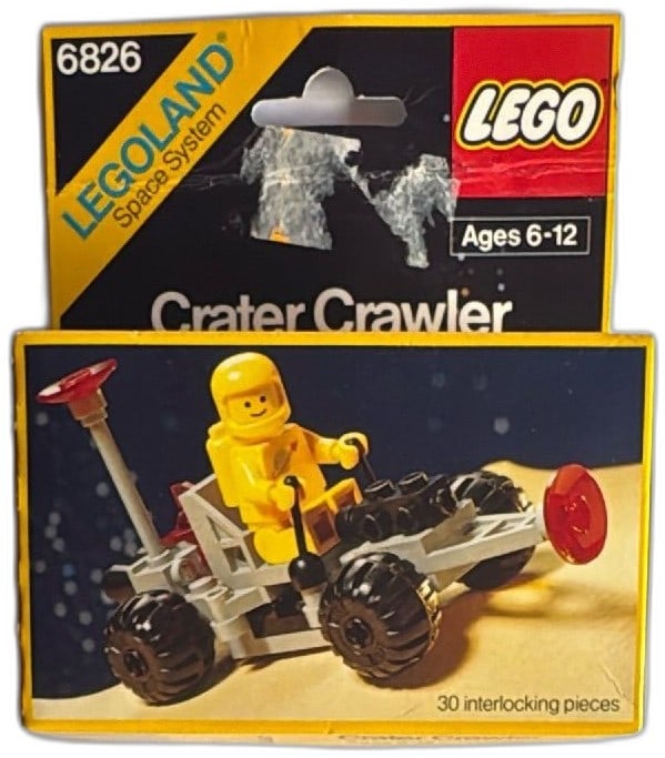 LEGO 6826 Crater Crawler Legoland Space System 1985 Yellow Classic Boxed: LEGO 6826 Crater Crawler from the Legoland Space System, 1985. Includes 30 interlocking pieces and classic yellow space minifigure, all in original vintage box. Box shows some wear and minor damage, c