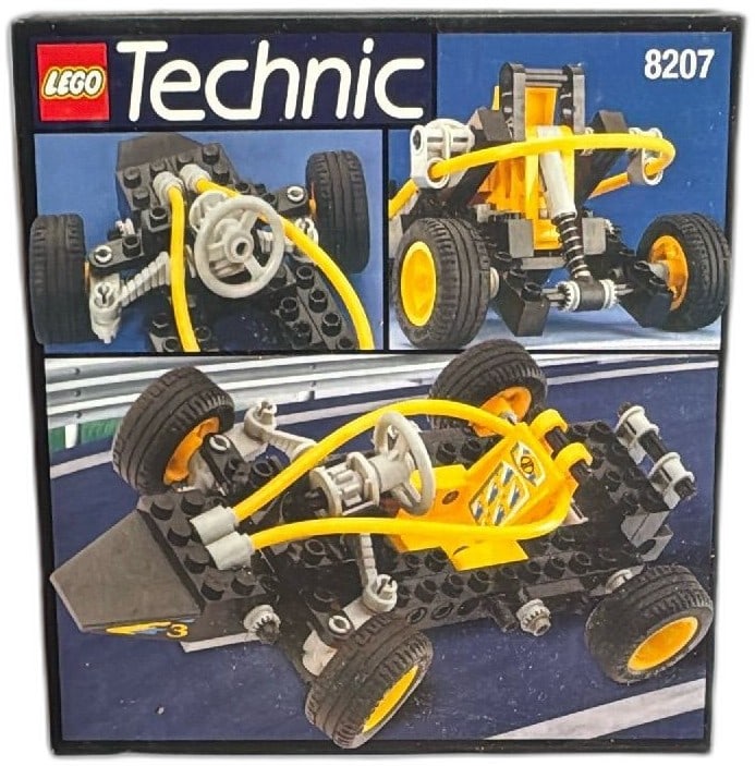 LEGO Technic 8207 Dune Buggy 82 Pieces 1996 Vintage Building Set Sealed: LEGO Technic 8207 Dune Buggy, vintage 1996 sealed set, features 82 pieces for building a yellow and black sand racer with steering function. The box shows minimal shelf wear and bright graphics. Great
