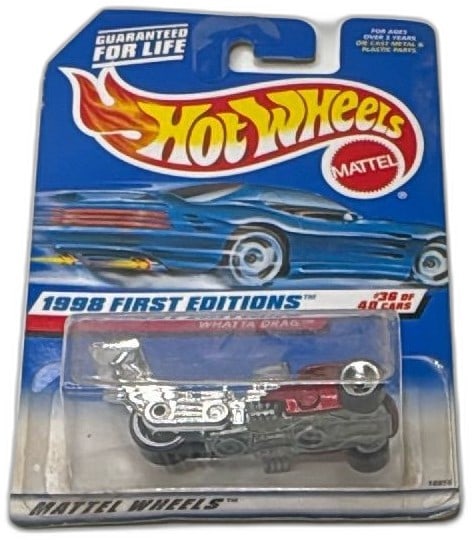 Hot Wheels Whatta Drag 1998 First Editions #36 of 40 Collector 673 Sealed: Hot Wheels Whatta Drag 1998 First Editions #36 of 40, sealed in original packaging. Collector #673 with vivid blue card, clear bubble, and chrome/red dragster. Mattel branding and “Guaranteed for Li