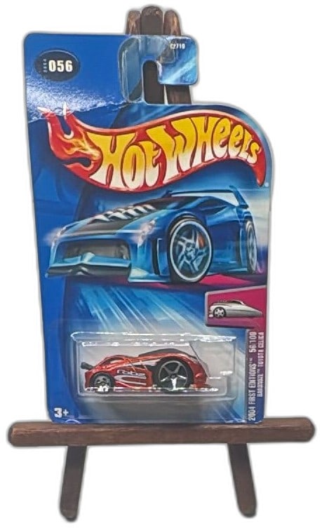 Hot Wheels 2004 First Editions Hardnoze Toyota Celica 56/100 Red Carded: Hot Wheels 2004 First Editions Hardnoze Toyota Celica 56/100, red color, factory-sealed on card. Mattel release with unique Hardnoze body style and special graphics. Packaging shows moderate wear and 