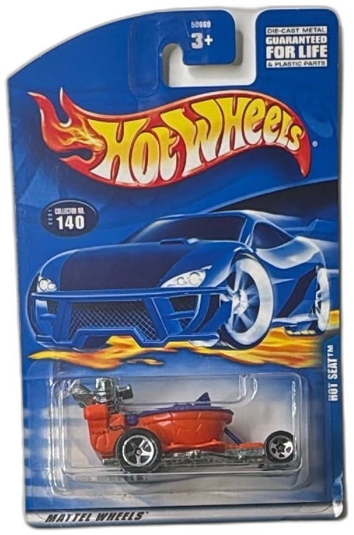 Hot Wheels 2000 Hot Seat Collection 140 New Sealed Mattel Diecast Car: Hot Wheels 2000 Hot Seat Collection 140 die-cast car, new in original sealed packaging. Features a unique red and chrome "toilet" car design marked as "Hot Seat." Made by Mattel, part of the 2000 seri