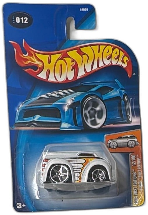 Hot Wheels 2004 First Editions Blings Dairy Delivery 12/100 New Sealed: Hot Wheels 2004 First Editions Blings Dairy Delivery diecast car, number 12 of 100, mint on card and factory sealed. Features chrome body with orange and yellow graphics, oversized wheels, and signatu